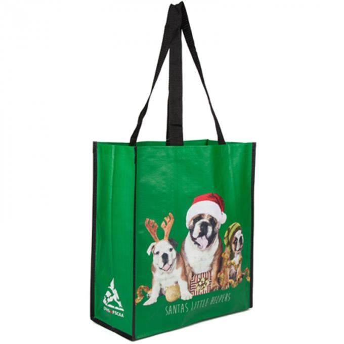 Grüne wiederverwendbare Polypropylen-Einkaufstaschen mit dem drei hübsche Hundevollseil